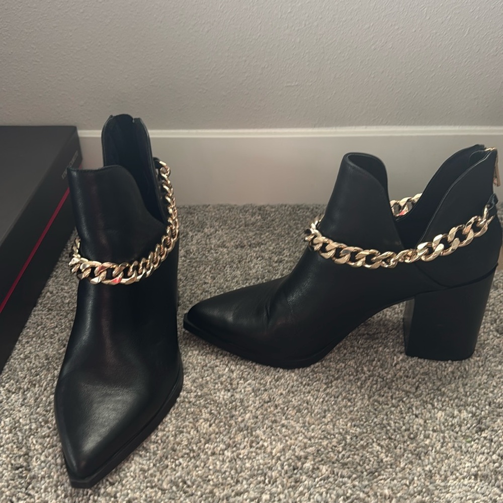 Steve Madden Black booties with gold chain detail. Size 8.5